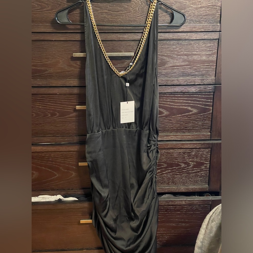 generation love black mini dress. gold chain detail. size medium. NWT